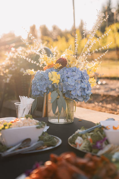 Elegant table setting with flowers at Moore Family Vineyards